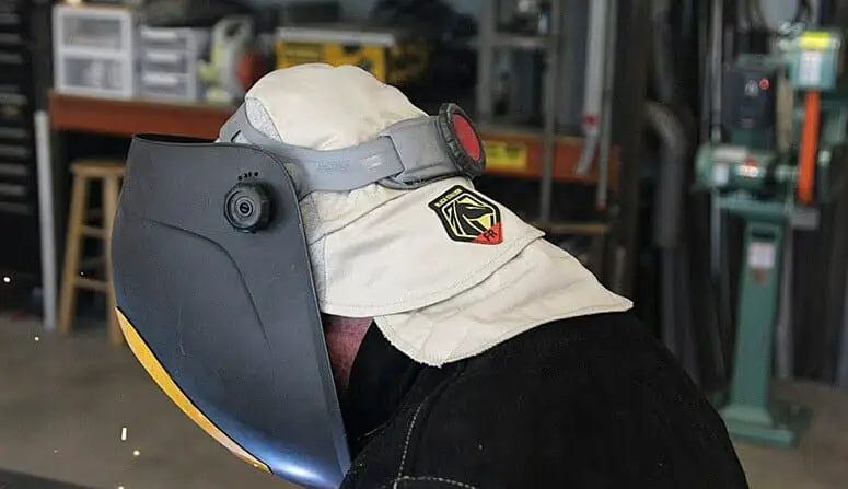 man with a welding cap and helmet