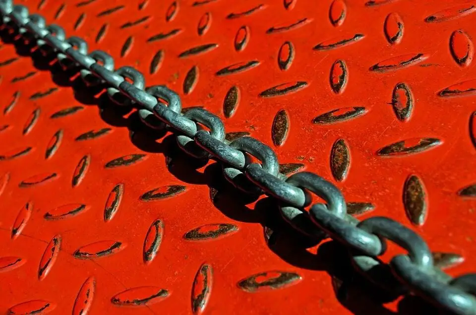 black chain with red metal background